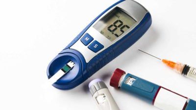 Diabetic Measuring Lancet Instruments on White Background - Biostatistics services | Amarex